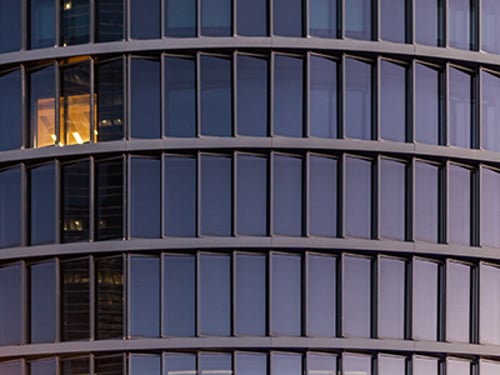 Purple Sunset Reflections on a Glass Building Facade