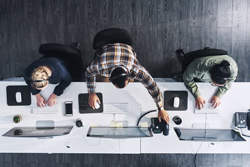 High angle shot of a group of call centre agents working in an office